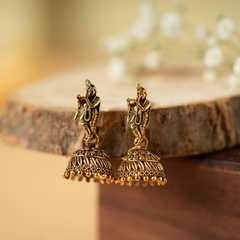 Gold plated shri krishna designe earrings