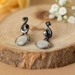 Black Design In White Pearl Stud Earrings