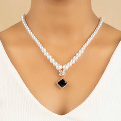 Black Diamond Pendant Gold Plated White Pearl Mala With Earrings - Rukhmani
