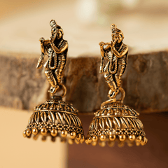 Gold plated shri krishna designe earrings